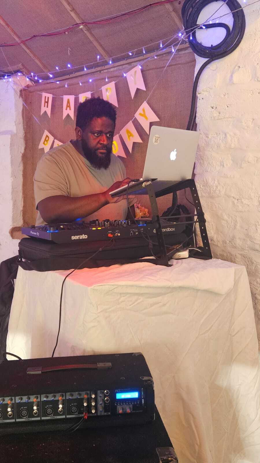 DJ S.M.A at an event booth